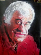 Vtipná karikatúra Jean-Paula Belmonda so širokým úsmevom, rozstrapatenými vlasmi a typickým výrazným nosom