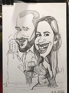 Umelecká atrakcia na večierku v Bratislave, karikaturista Janko zachytáva charakteristické črty hostí naživo.